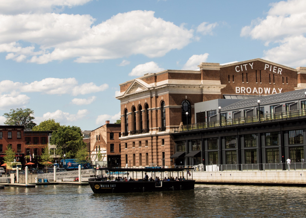 Justin Tsucalas Water Taxi dropping off passangers in Fells Point.