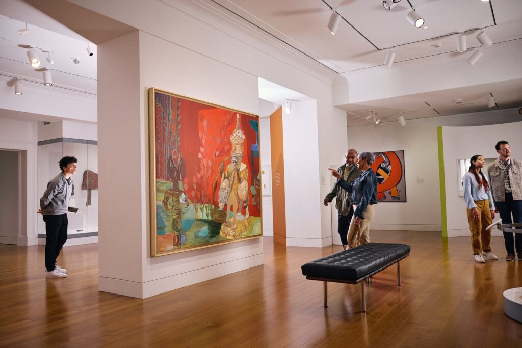 People looking at art in gallery