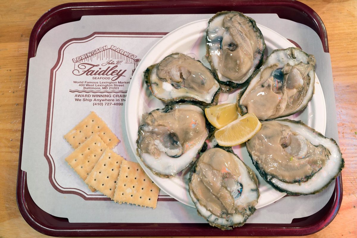 A raw oysters and crackers on a tray at Finleys in Baltimore.