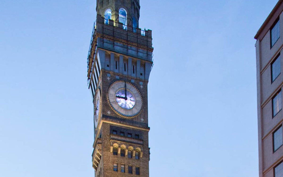 Outside view of The Bromo Tower at night in Baltimore, Maryland.