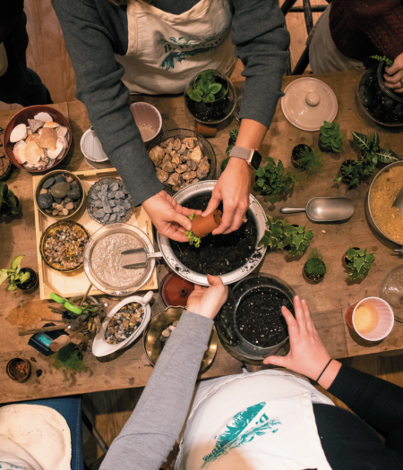 Arms and hands of folks from the maker community at B Willow Shop.